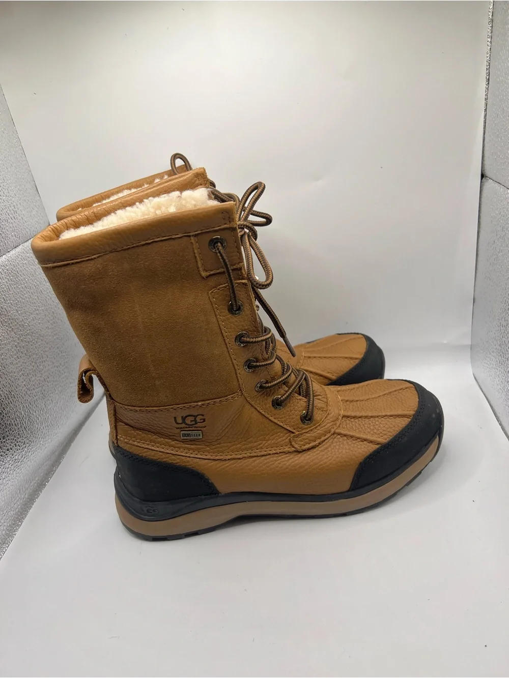 UGG  Tan and Black Waterproof Lace-Up Snow Boots